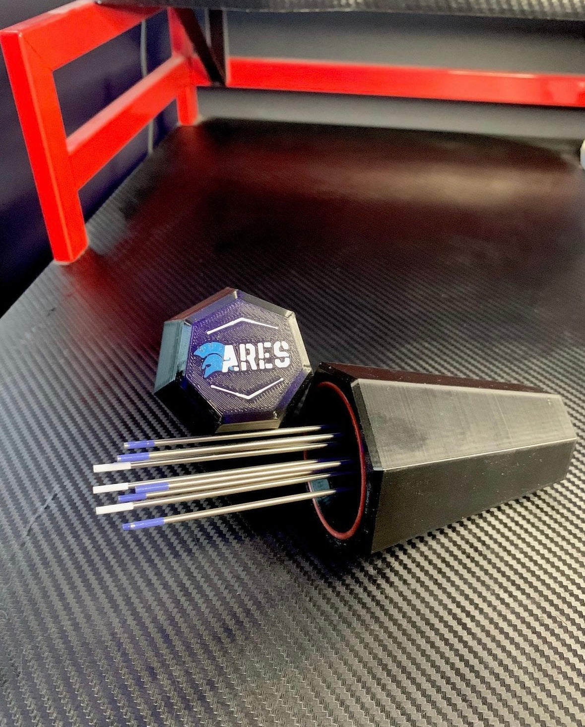 Ares TIG Rig Tungsten holder on carbon fibre desk