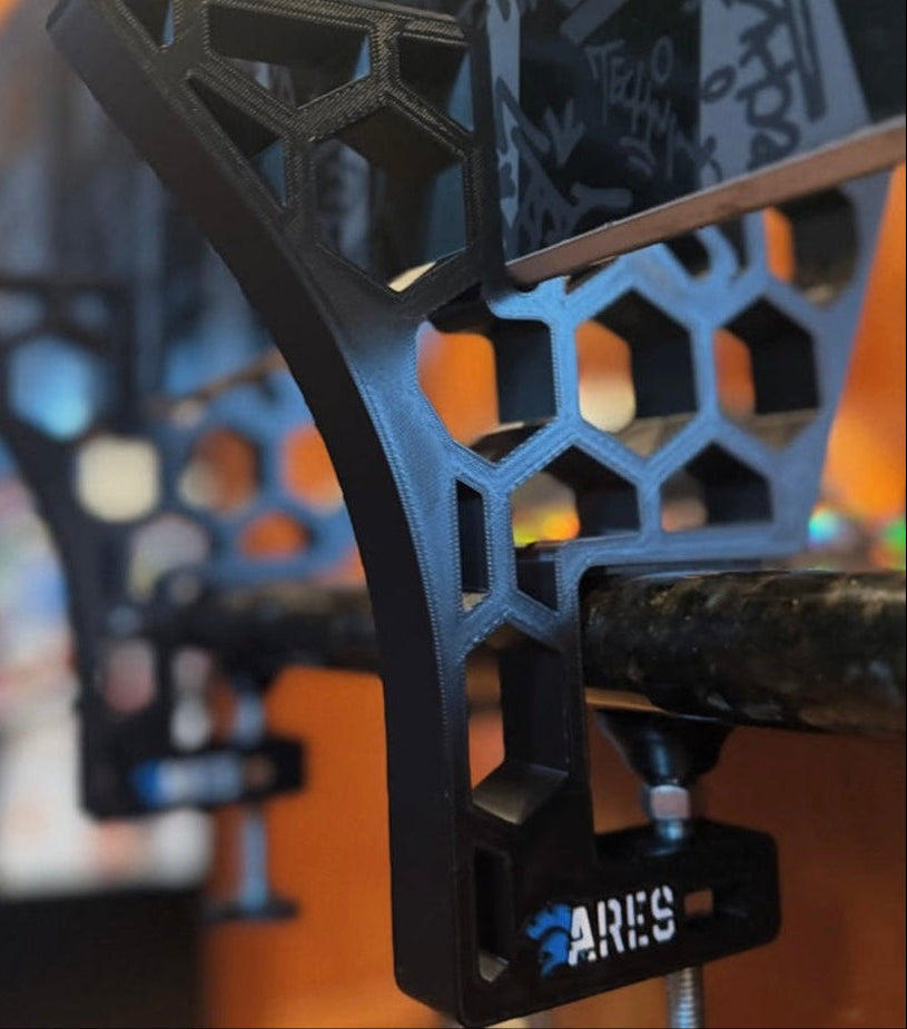 Close up of the ARES snowboard Tuning and waxing stand being used on the kitchen table